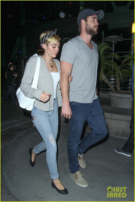 Miley Cyrus Liam Hemsworth Hold Hands On Movie Date Photo