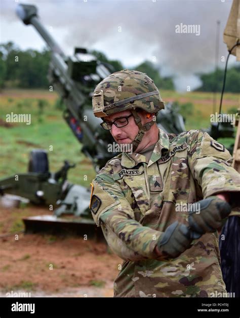 Sergeant Lucas Frazee Fires The M777A2 Howitzer During A Live Fire