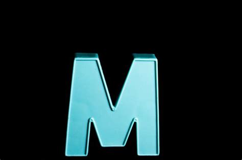 letter m on black background | Black backgrounds, Lettering, Background