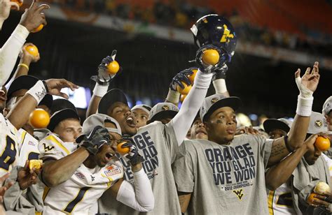 West Virginia routs Clemson in Orange Bowl - The Boston Globe