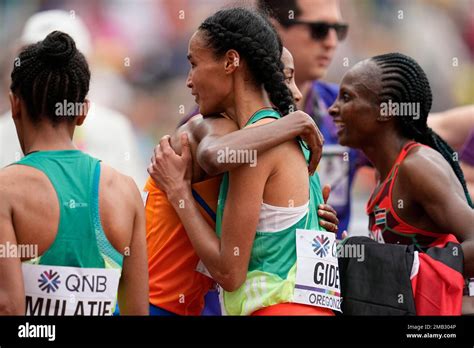 Letesenbet Gidey Of Ethiopia Gets A Hug From Sifan Hassan Of The