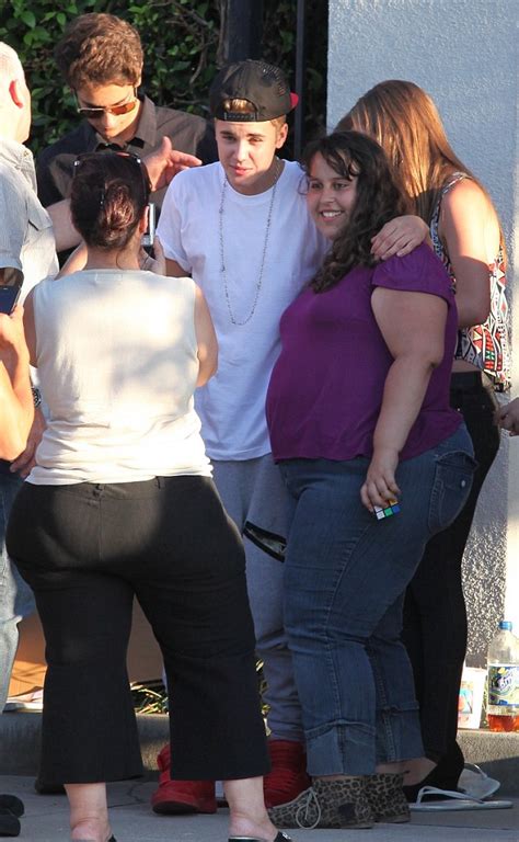 Justin Bieber Treats Eager Fans To Cuddles And Funny Faces As He Poses