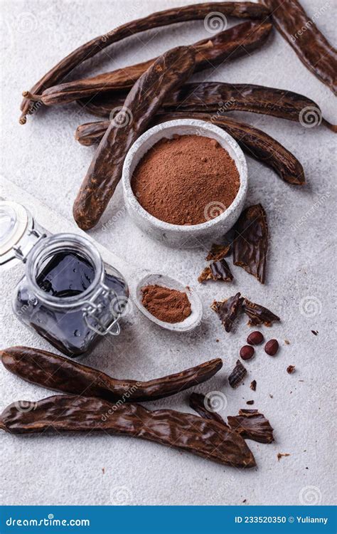 Carob Pods Powder And Molasses Or Syrup Stock Photo Image Of