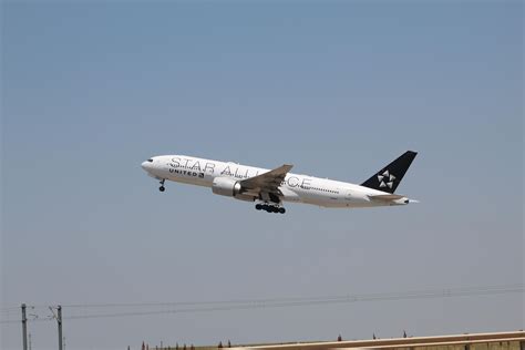 United Star Alliance 777 blasting out of KDEN after a 25 departure to