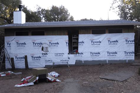 How to DIY Tyvek House Wrap at the Fixer Upper Main House - One Hundred ...