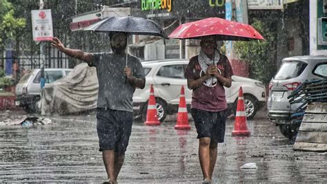 Photos Splash Of Rain Brings Respite From Heat In Delhi Ncr The