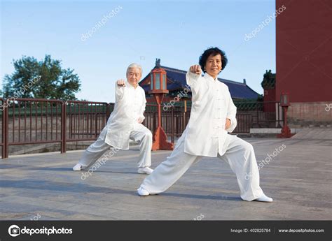 Two Old People Playing Tai Chi Park — Stock Photo © eastfenceimage ...