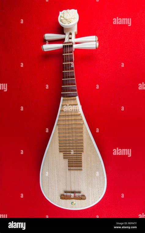 Pipa Chinese guitar, four-stringed lute with 30 frets and pear-shaped ...