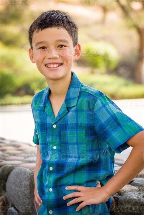 Outdoor Portrait Of A Biracial Chinese And Caucasian Boy