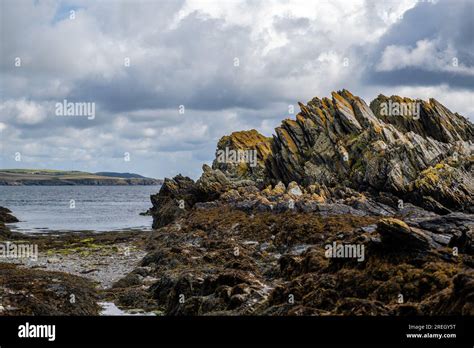 The Sharp Jagged Limestone Rocks Around The Rugged Seaside Of The Isle