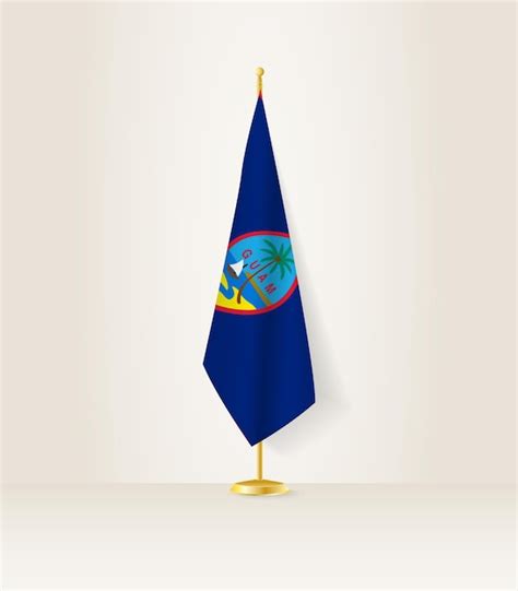 Bandera De Guam En Un Soporte De Bandera Vector Premium