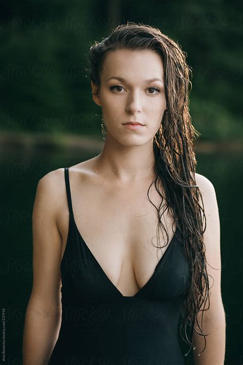 A Portrait Of A Beautiful Brunette With Long Wet Hair After A Swim By Stocksy Contributor A