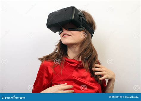 Sexy Mysterious Woman In A Red Dress Wearing Oculus Rift VR Virtual