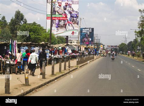 Clothes Stalls Line The Pavement Along Jogoo Road As People And Traffic