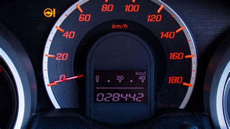 how to check car mileage on dashboard