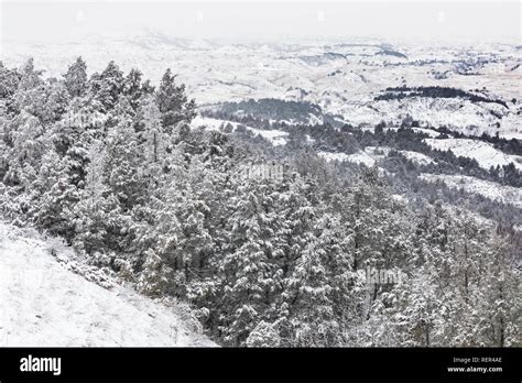 Winter landscape of snowy badlands and hills in Theodore Roosevelt ...