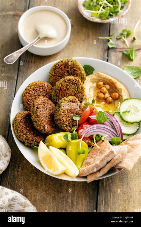 Baked Falafel Bowl With Hummus And Vegetables Stock Photo Alamy