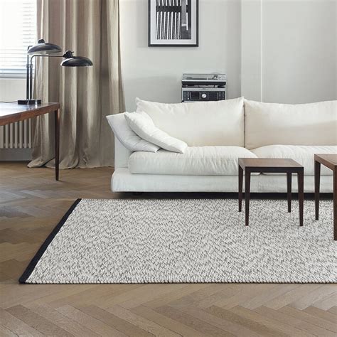 Tapis moderne noir et blanc en laine avec lignes géométriques SHIFT par