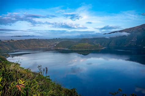 Premium Photo | Cuicocha crater lake at the foot of Cotacachi Volcano ...