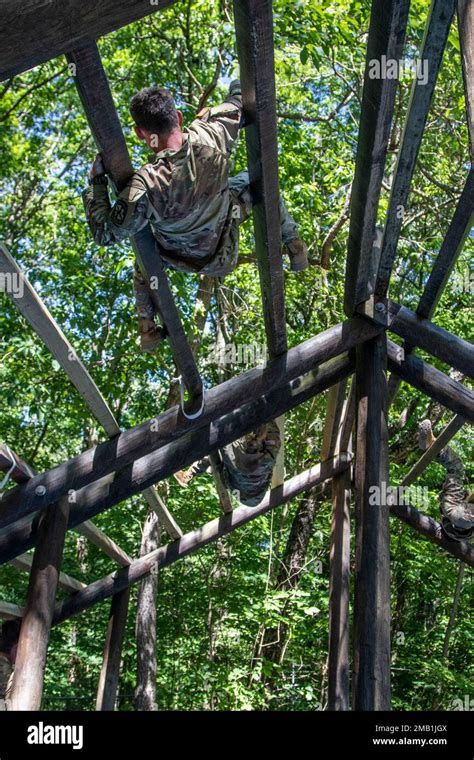 Cadets Climb Up The Weaver Obstacle On The Obstacle Course On Fort Knox