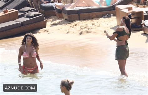 Teresa Giudice Wows In A Pink Halterneck Bikini While Relaxing On The Beach In Mykonos AZNude