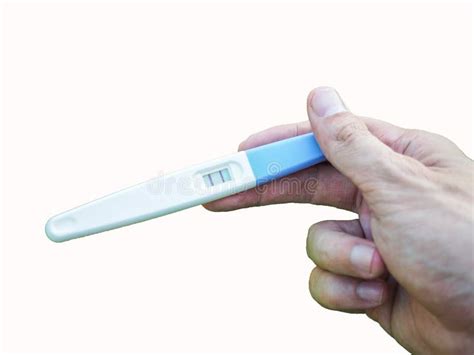 Closeup Hand Impressions Positive Pregnancy Test Over A Background