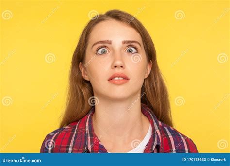 Closeup Portrait Of Funny Silly Ginger Woman In Checkered Shirt Looking