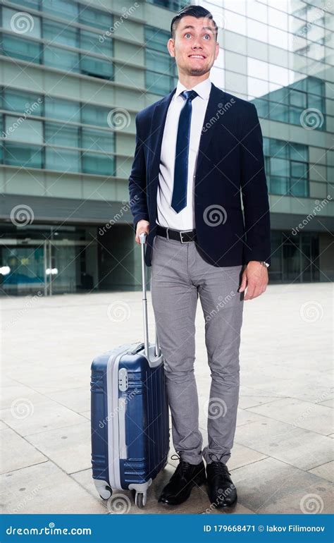 Adult Businessman In Suit With Suitcase Is Staying Stock Image Image