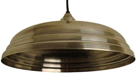 A Large Metal Light Hanging From A Ceiling