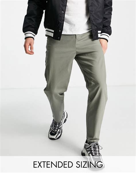 Заказать Брюки чиносы Свободные брюки чиносы цвета хаки с прикорневым ...