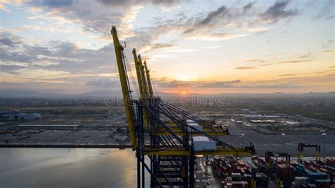 Aerial View Commercial Sea Port Warehouse And Crane Ship Container