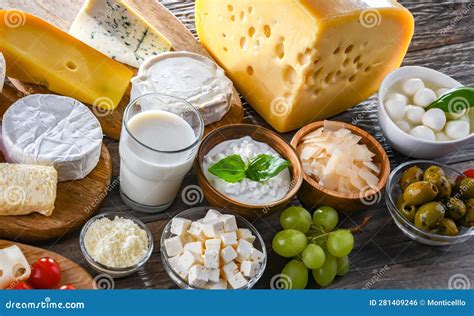 A Variety of Dairy Products Including Cheese, Milk and Yogurt Stock Photo - Image of mold, edam ...