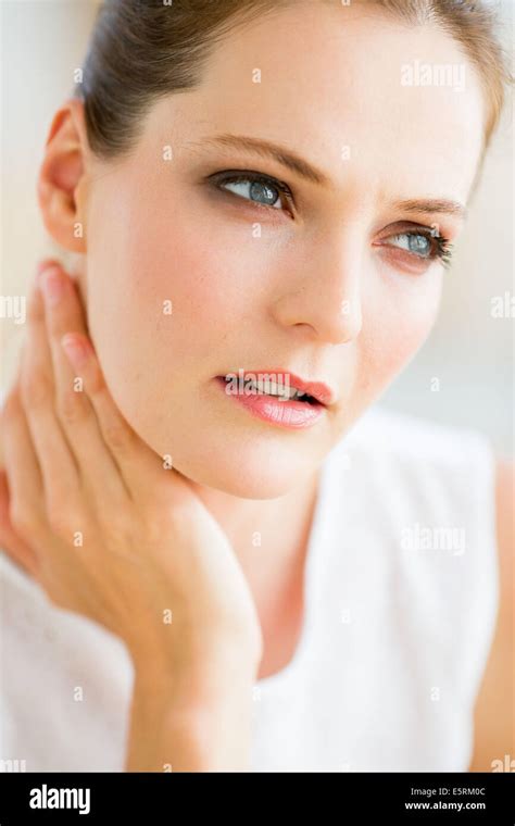 Woman Suffering From Neck Pain Stock Photo Alamy