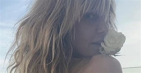 Heidi Klum Goes Braless As She Strips Down Into String Bikini For Sultry Beach Snap Daily Star