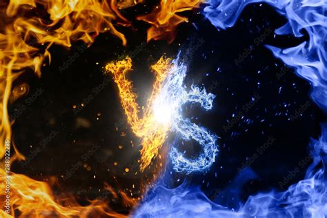 Letter VS. Blue versus Yellow fire flames on black isolated background ...