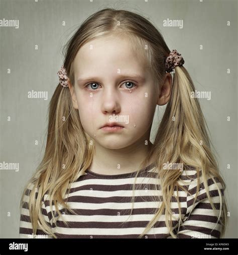 Child with tears - young girl crying, fine art portrait Stock Photo - Alamy