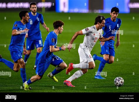 GRANADA, SPAIN - MARCH 25: Kostas Tsimikas of Greece, Mikel Oyarzabal ...