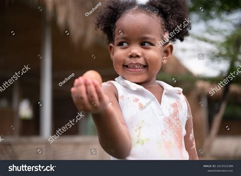 Happy African American Kid Girl Holding Stock Photo 2215515389