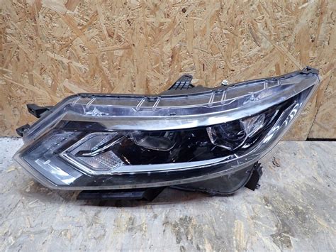 LAMPA LEWA REFLEKTOR LEWY NISSAN QASHQAI 2 II J11 LIFT 26060HV00B