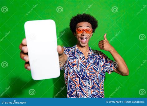 Photo Of Excited Confident Man Dressed Print Shirt Eyewear Showing