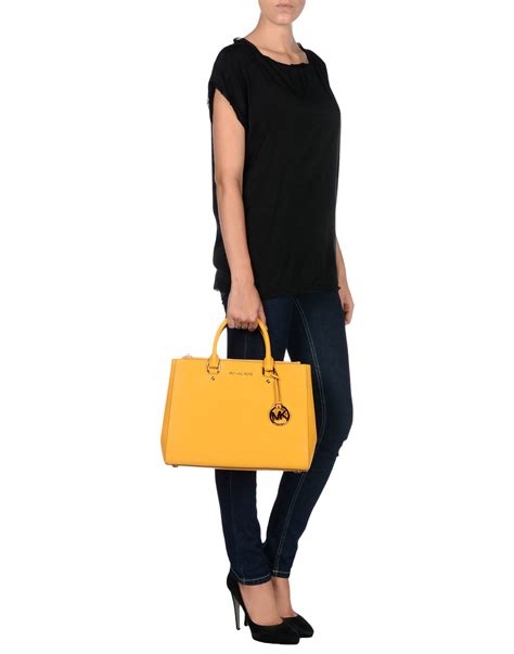 Lyst MICHAEL Michael Kors Handbag In Yellow