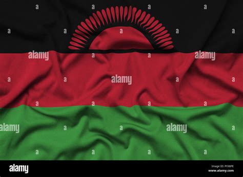 Malawi Flag Is Depicted On A Sports Cloth Fabric With Many Folds Sport