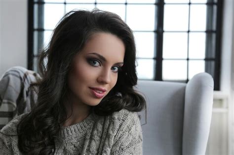 Premium Photo Beautiful Brunette Sitting In Chair