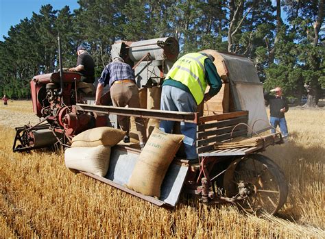 Free Images Tractor Field Farm Farming Harvest Vehicle Crop