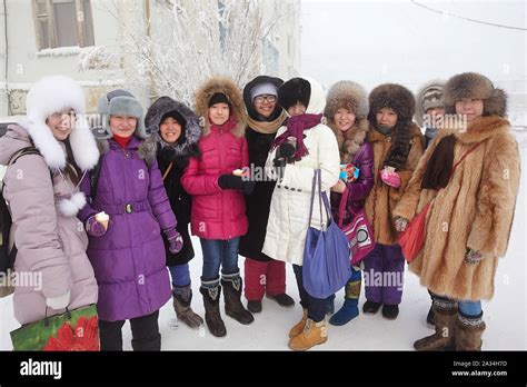 Russia Yakutsk Young people having fun in the cold -42 degrees Celcius ...