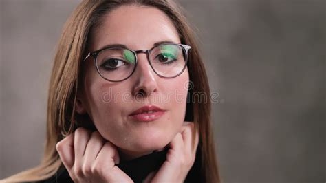 Close Up Of A Blonde Girl With A Beautiful Face Smiles At The Camera Extreme Slow Motion