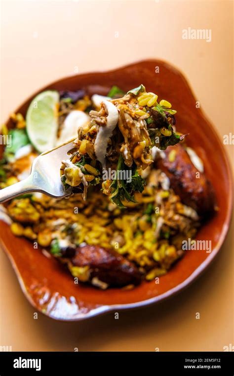 Jamaican Jerk Chicken Rice Bowl With Sweet Plantains And Hot Sauce