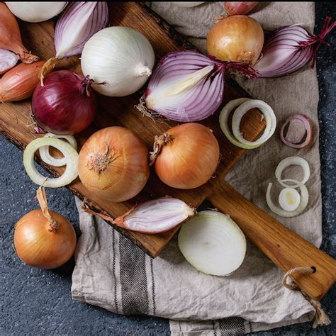 Premium Photo Variety Of Whole And Sliced Onion