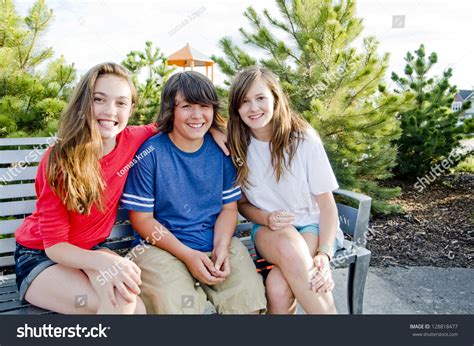 Two Girls One Boy Youths Sitting Stock Photo 128818477 Shutterstock