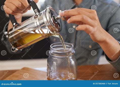 Plunger Preparation Woman Using A Plunger To Prepare A Beverage Stock